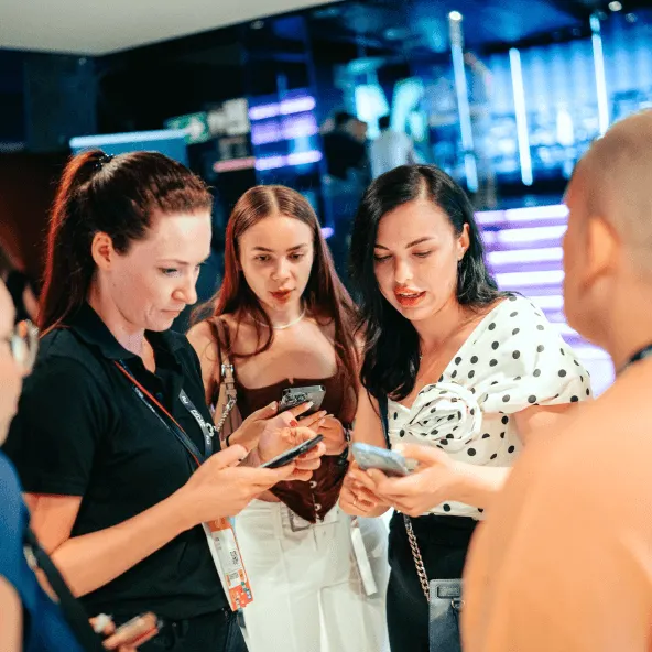 Affiliate World Asia attendees networking at an evening mixer