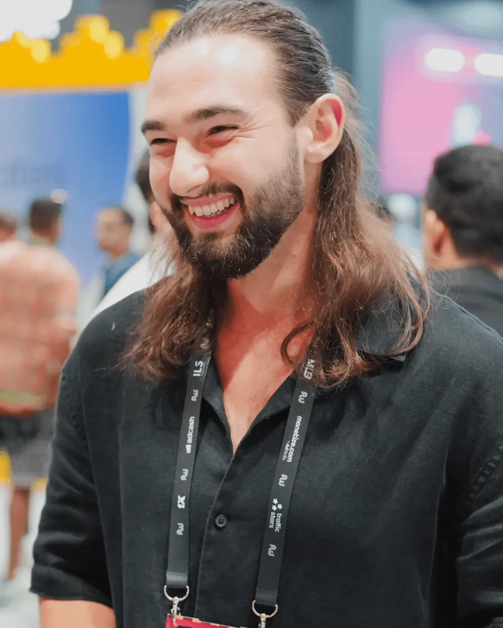 Affiliate World attendee with conference badge