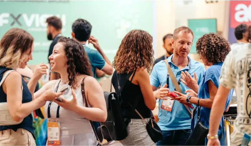 Affiliate World attendees networking on the expo floor